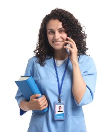 Photo of Medical student with book talking on phone against white background