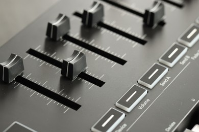 Photo of One portable MIDI keyboard with faders, closeup