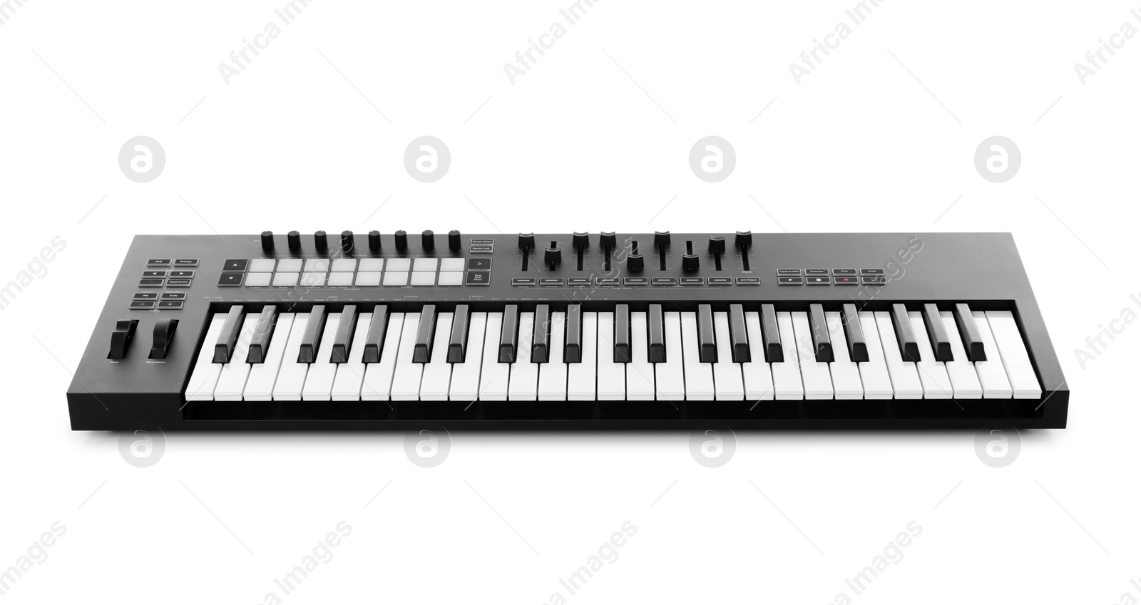 One portable MIDI keyboard isolated on white Photo of One portable MIDI keyboard isolated on white