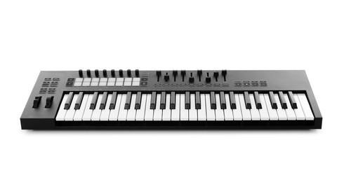 Photo of One portable MIDI keyboard isolated on white
