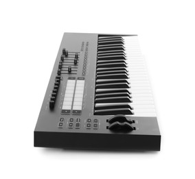 Photo of One portable MIDI keyboard isolated on white
