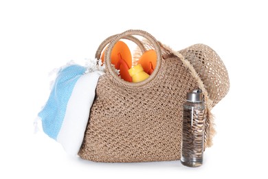 Photo of Stylish bag with beach accessories isolated on white