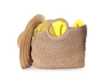 Photo of Stylish bag with beach accessories isolated on white