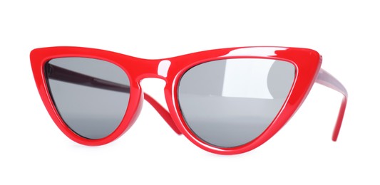 Photo of Beautiful retro red sunglasses isolated on white