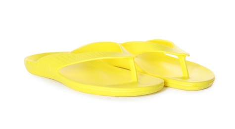 Photo of Yellow flip-flops isolated on white. Beach accessory
