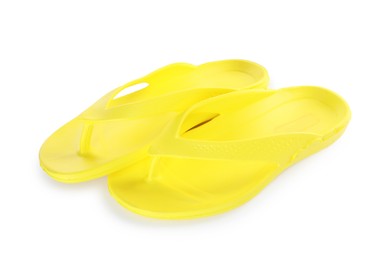 Photo of Yellow flip-flops isolated on white. Beach accessory