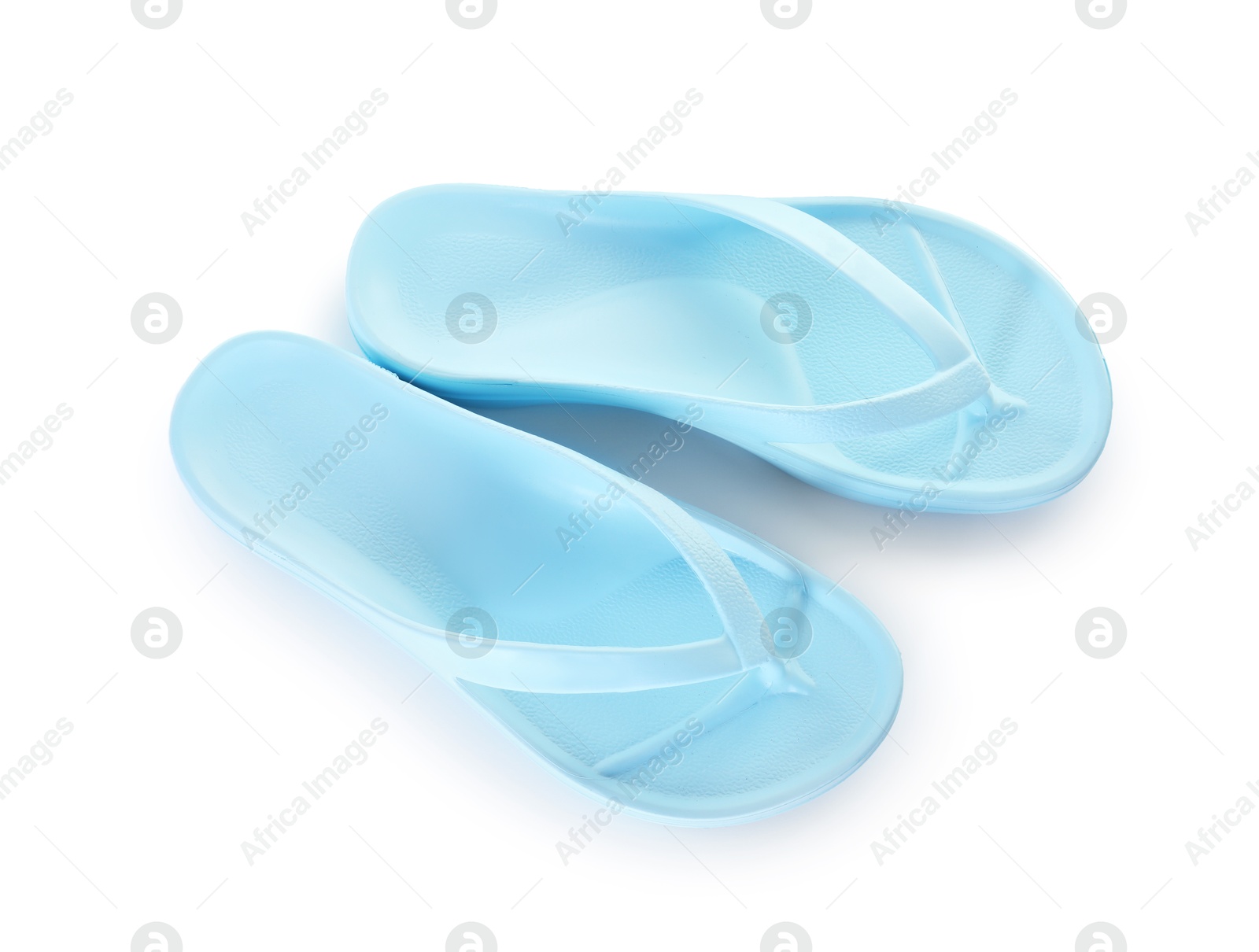 Blue flip-flops isolated on white, top view. Beach accessory Photo of Blue flip-flops isolated on white, top view. Beach accessory