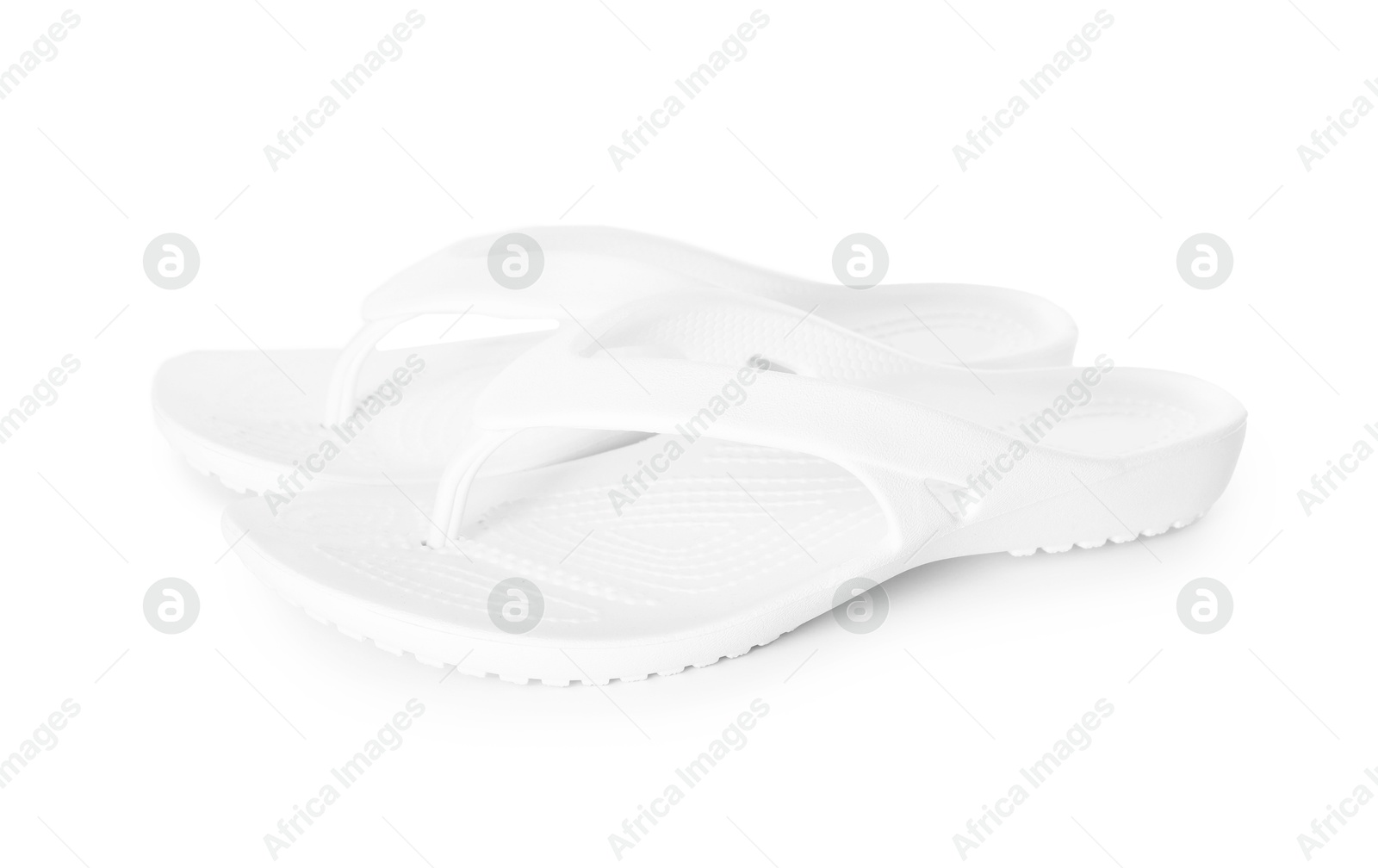 Stylish flip-flops isolated on white. Beach accessory Photo of Stylish flip-flops isolated on white. Beach accessory