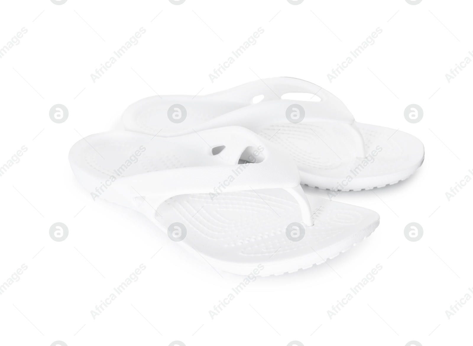 Stylish flip-flops isolated on white. Beach accessory Photo of Stylish flip-flops isolated on white. Beach accessory