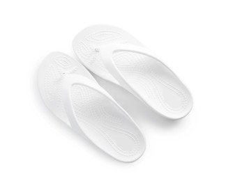 Photo of Stylish flip-flops isolated on white, top view. Beach accessory