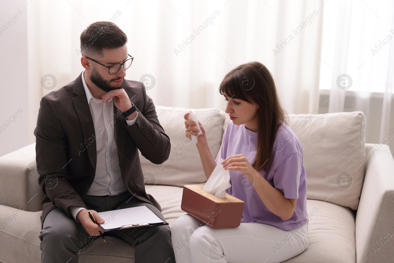 Photo of Professional psychologist working with patient in office