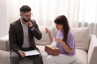 Photo of Professional psychologist working with patient in office
