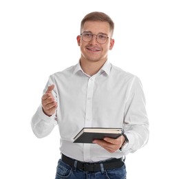 Photo of Portrait of smiling psychologist in glasses with notepad welcoming on white background