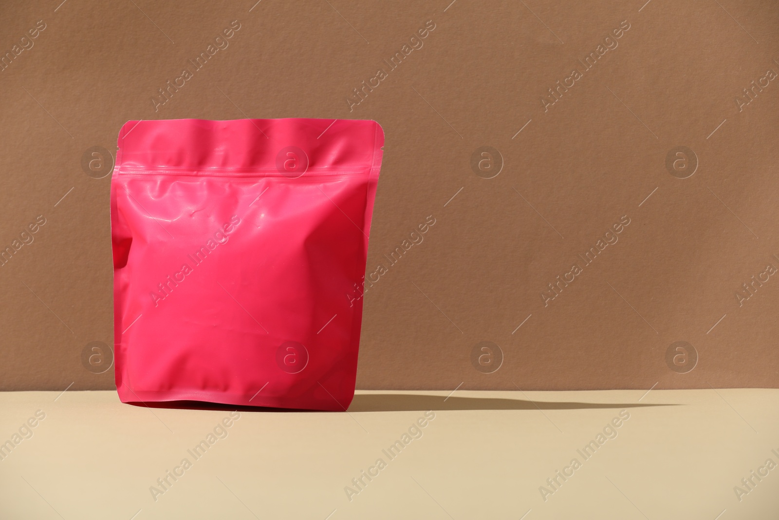 Photo of Zipper stand-up pouch on color background, mockup for design