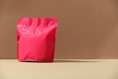 Photo of Zipper stand-up pouch on color background, mockup for design