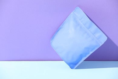 Photo of Zipper stand-up pouch on color background, mockup for design