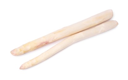 Photo of Two raw asparagus spears isolated on white, top view