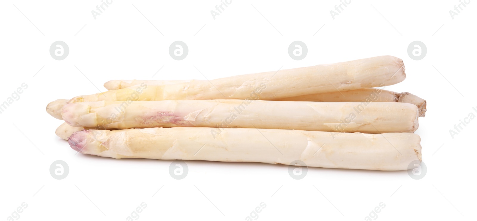 Many raw asparagus spears isolated on white Photo of Many raw asparagus spears isolated on white
