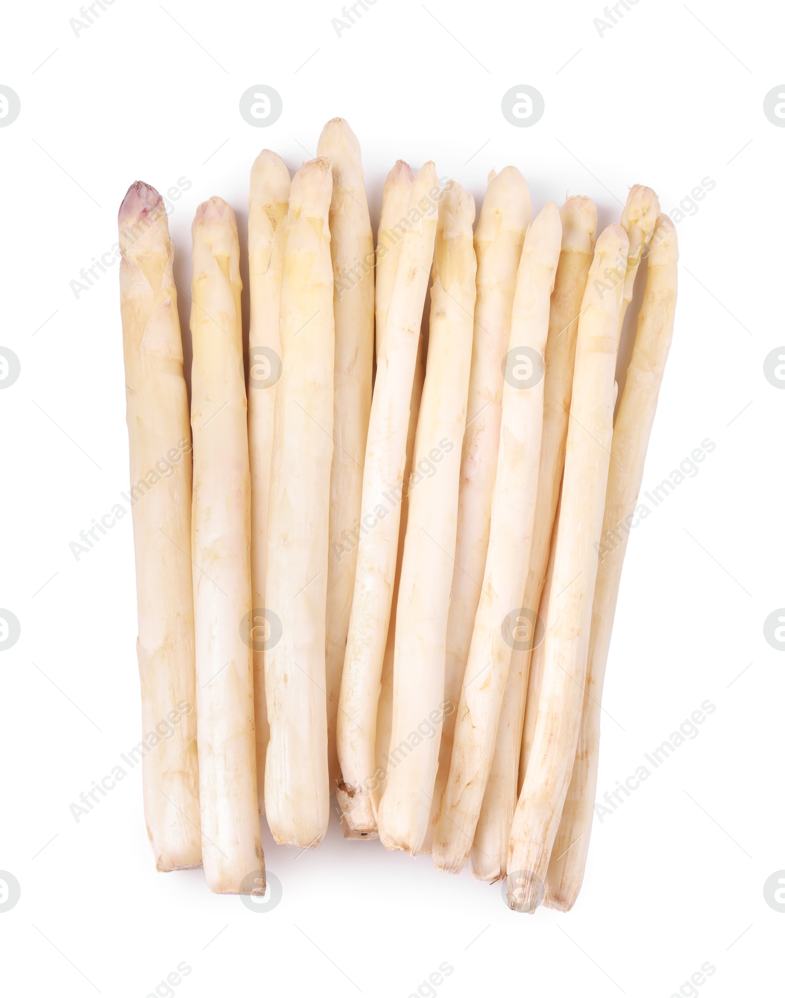 Many raw asparagus spears isolated on white, top view Photo of Many raw asparagus spears isolated on white, top view