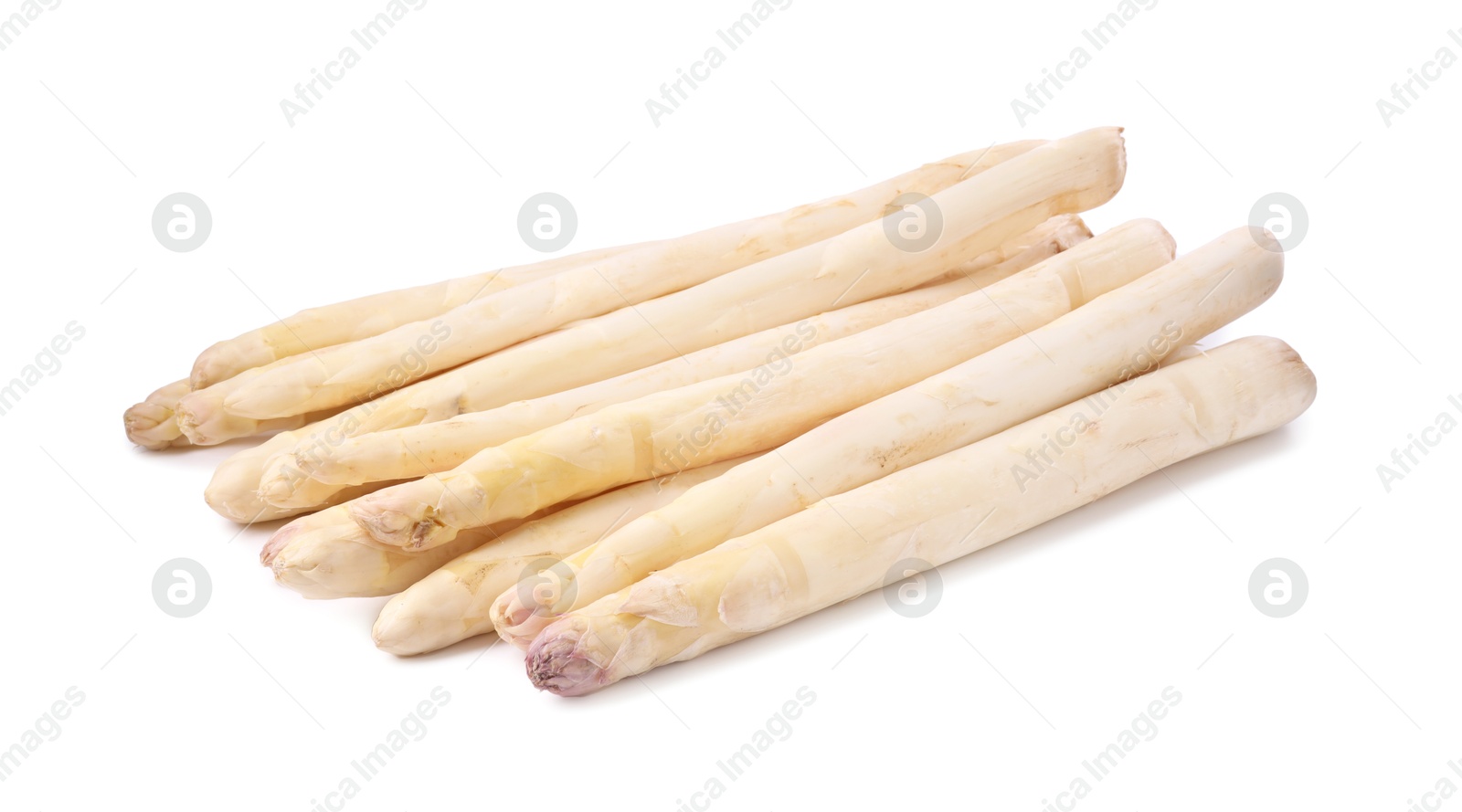 Many raw asparagus spears isolated on white Photo of Many raw asparagus spears isolated on white
