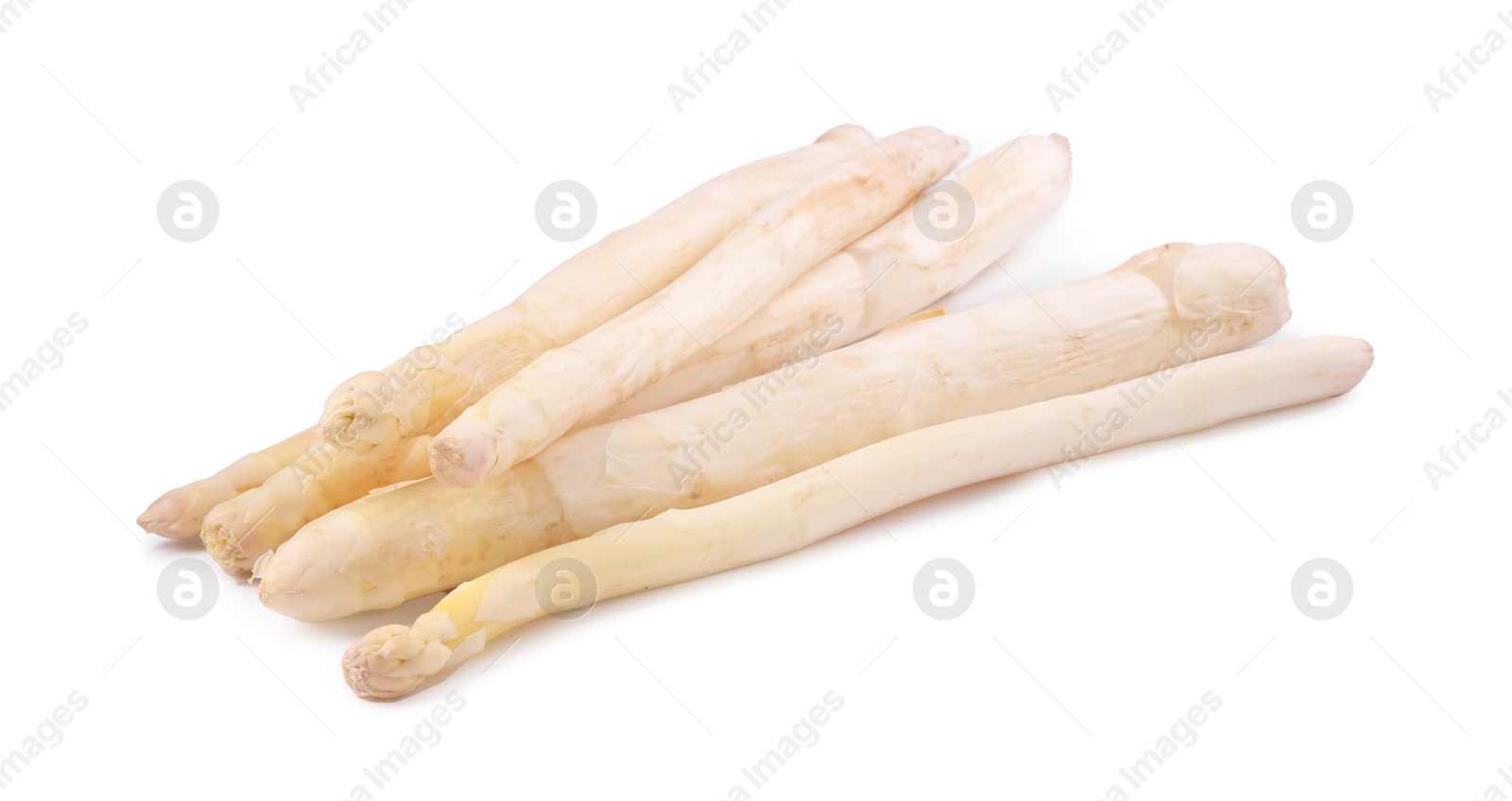 Many raw asparagus spears isolated on white Photo of Many raw asparagus spears isolated on white