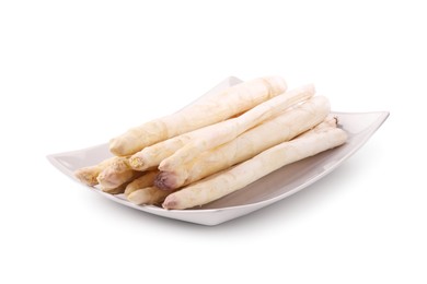 Photo of Many raw asparagus spears isolated on white