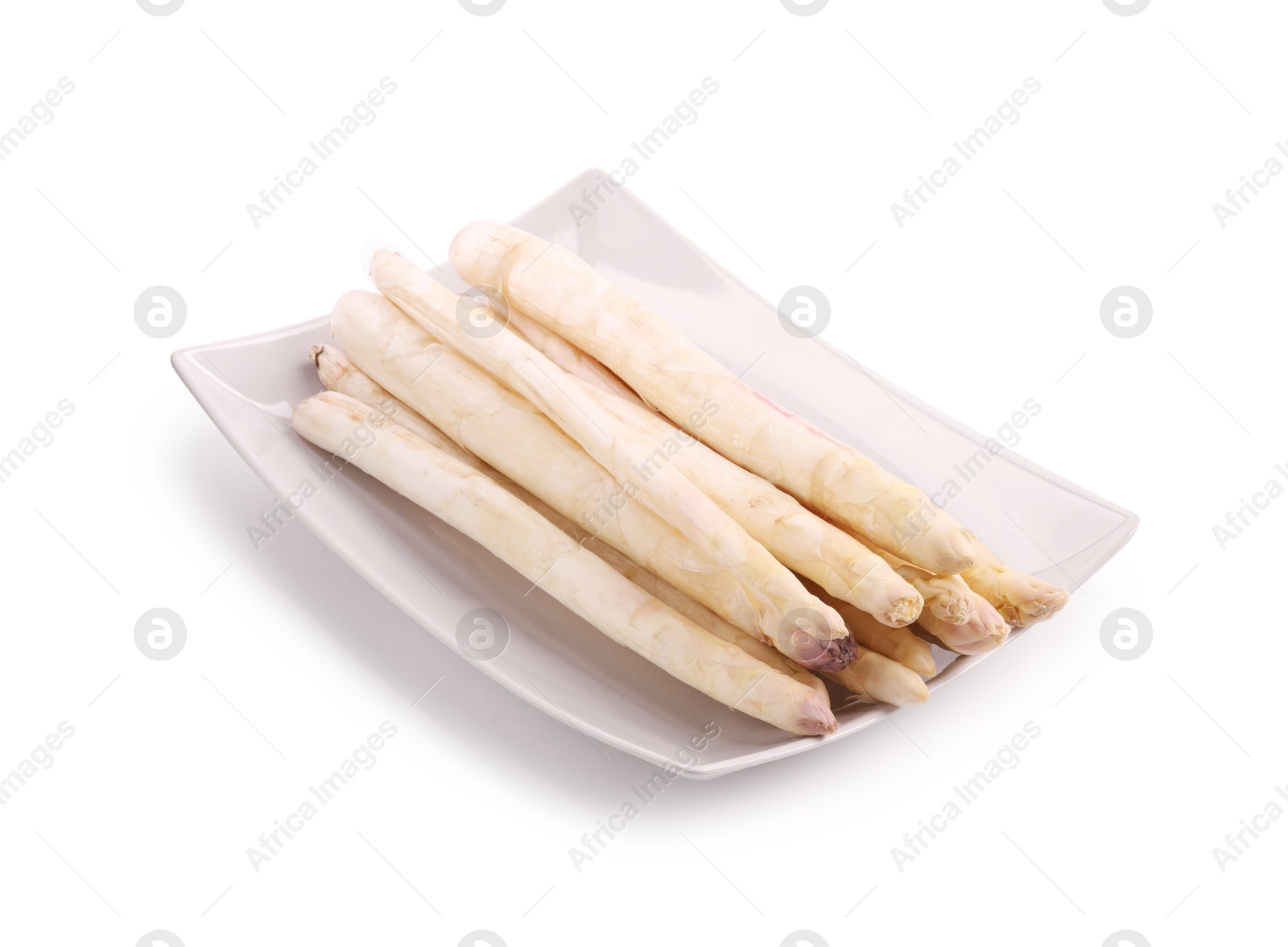 Many raw asparagus spears isolated on white Photo of Many raw asparagus spears isolated on white