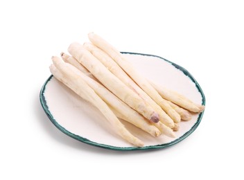 Photo of Many raw asparagus spears isolated on white