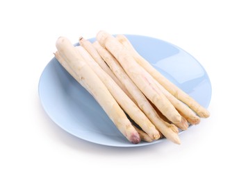 Photo of Many raw asparagus spears isolated on white