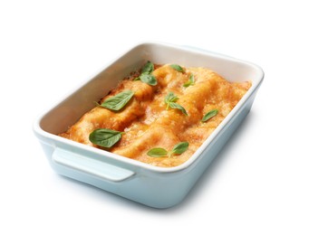 Photo of Tasty vegetarian lasagna in baking dish isolated on white
