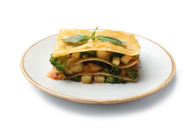 Photo of Piece of tasty vegetarian lasagna isolated on white