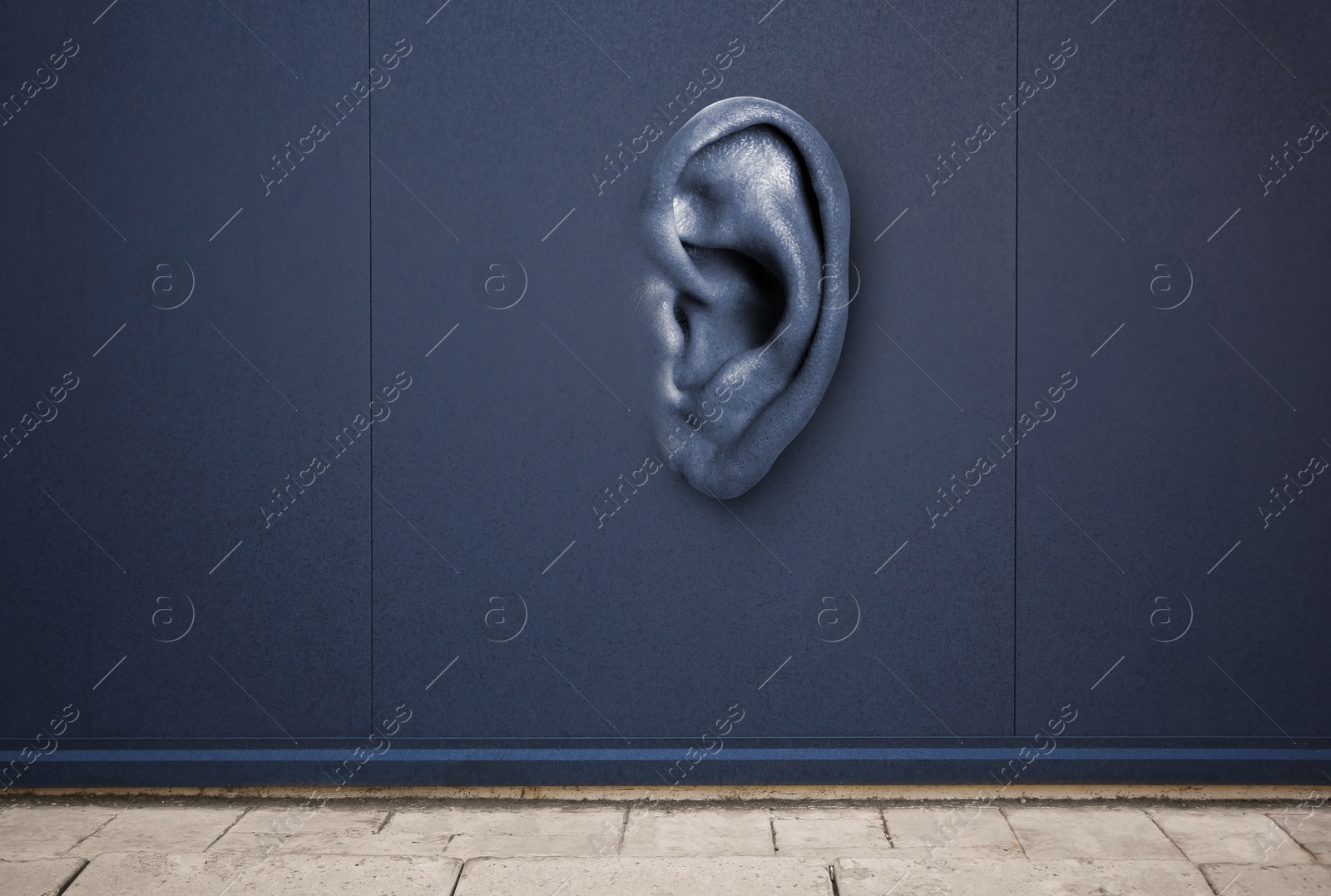 Human ear in blue wall. Eavesdropping, concept that even walls have ears Image of Human ear in blue wall. Eavesdropping, concept that even walls have ears