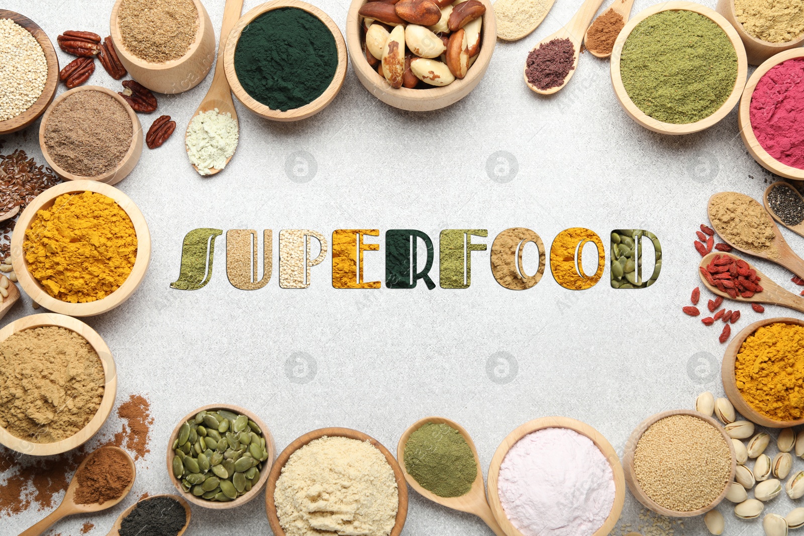 Superfood. Different powders and food products on light table, flat lay Image of Superfood. Different powders and food products on light table, flat lay