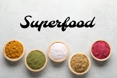 Image of Superfood. Different powders in bowls on light table, flat lay