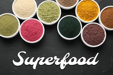 Image of Superfood. Different powders in bowls on black table, flat lay