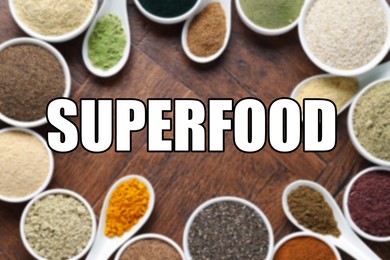 Image of Superfood. Different powders in bowls and spoons on wooden table, flat lay