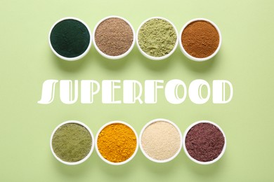 Image of Superfood. Different powders in bowls on light green background, flat lay