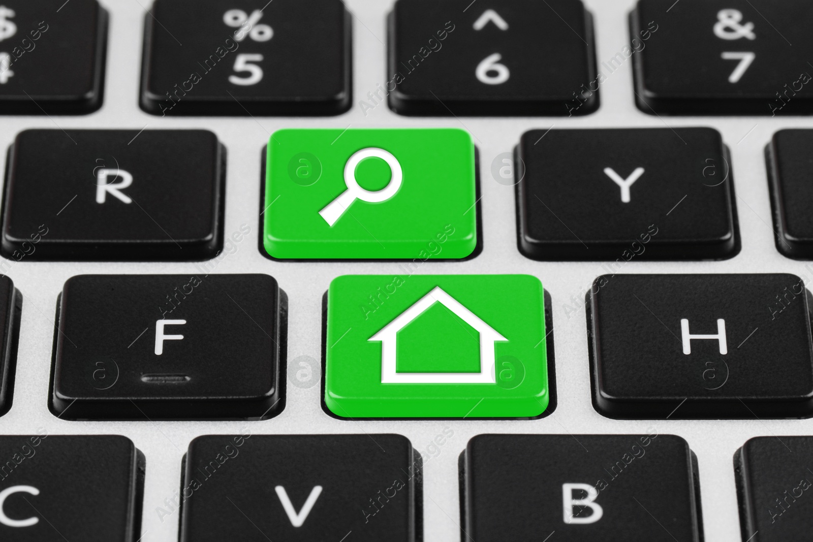 Image of Online accommodation search. Buttons with house and magnifying glass icons on computer keyboard, closeup