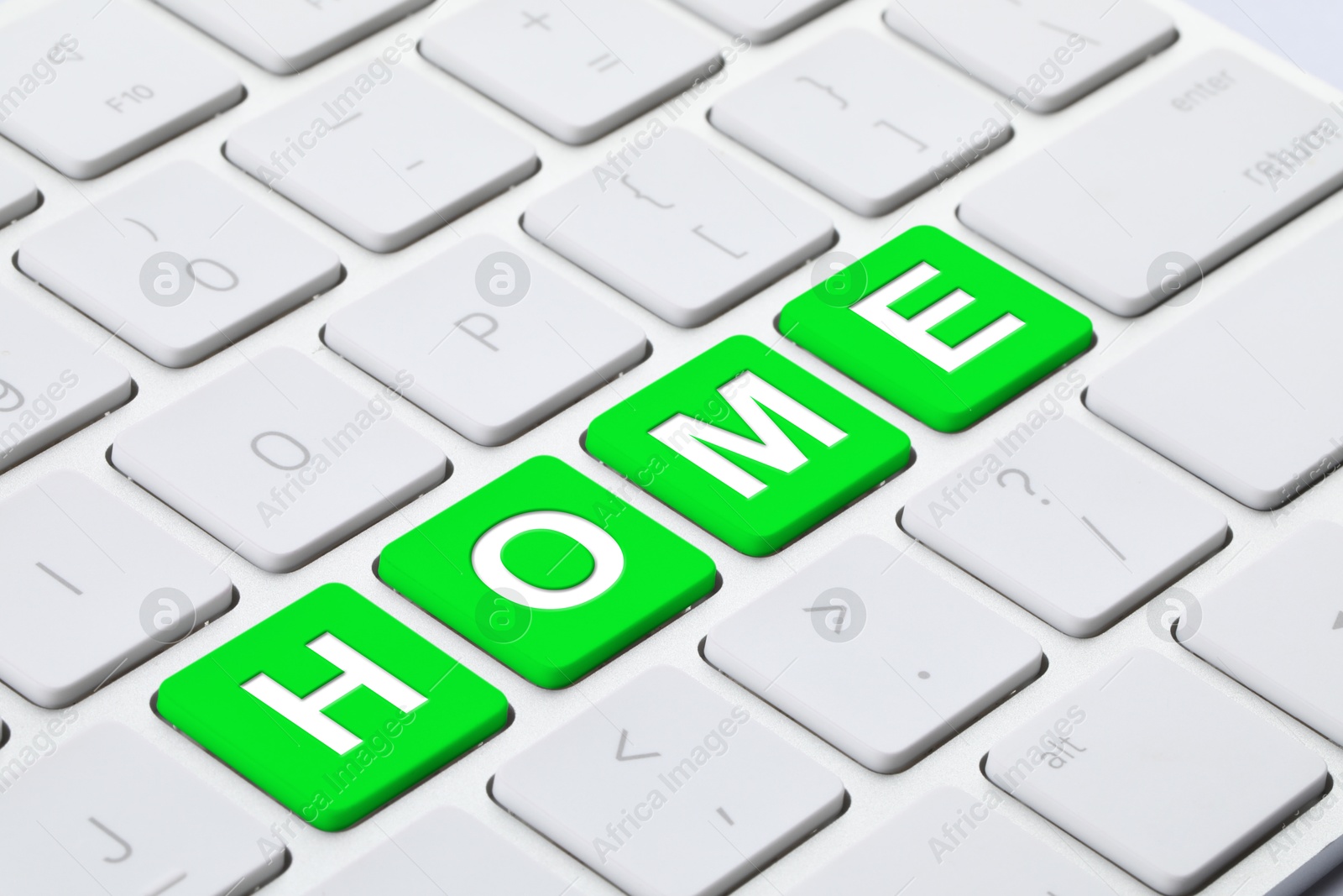 Online accommodation search. Word Home on computer keyboard, closeup Image of Online accommodation search. Word Home on computer keyboard, closeup