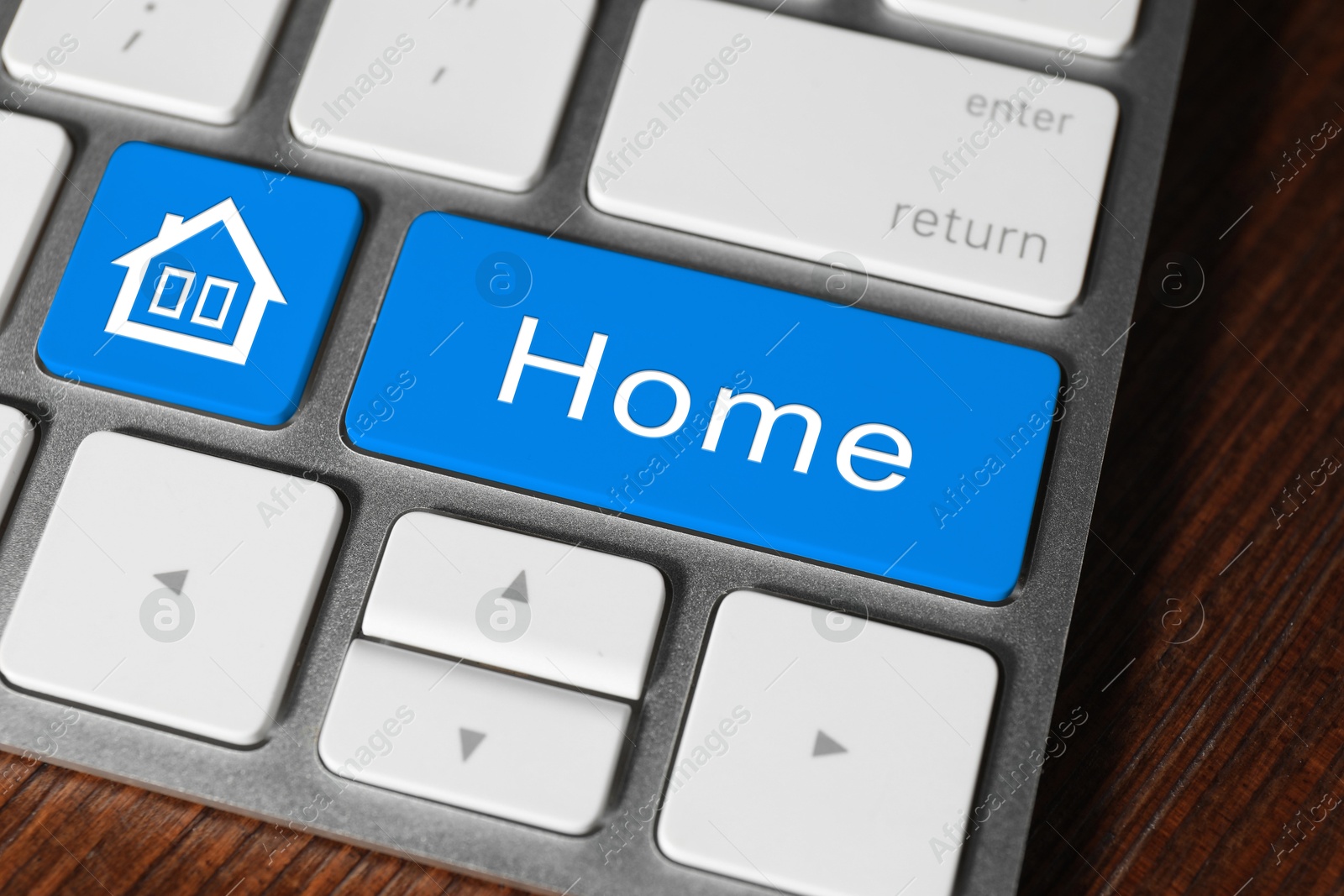 Image of Online accommodation search. Buttons with house icon and word House on computer keyboard, closeup