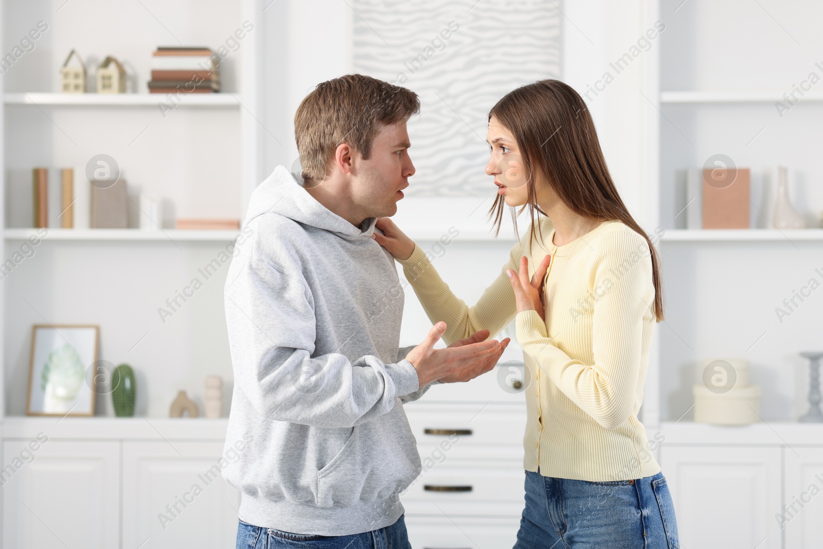 Woman and man having fight at home Photo of Woman and man having fight at home