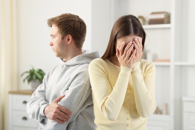 Photo of Woman and man having fight at home