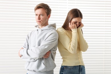 Photo of Woman and man having fight at home