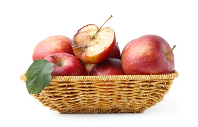 Photo of Spoiled apple and good ones in basket isolated on white