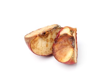 Photo of Pieces of spoiled apple isolated on white