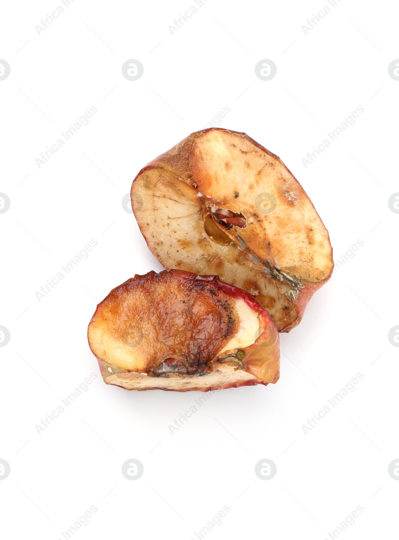 Pieces of spoiled apple isolated on white, top view Photo of Pieces of spoiled apple isolated on white, top view