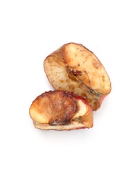 Photo of Pieces of spoiled apple isolated on white, top view