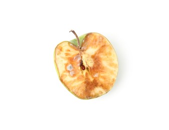 Photo of Piece of spoiled apple isolated on white, top view
