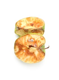 Photo of Pieces of spoiled apple isolated on white, top view