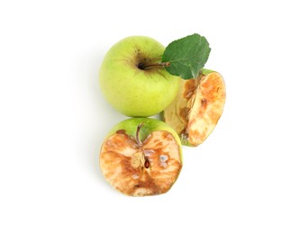 Photo of Spoiled and good apples isolated on white, top view